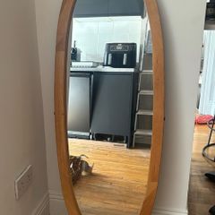Tall oval mirror