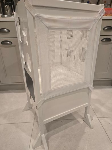 White wooden toddler learning tower