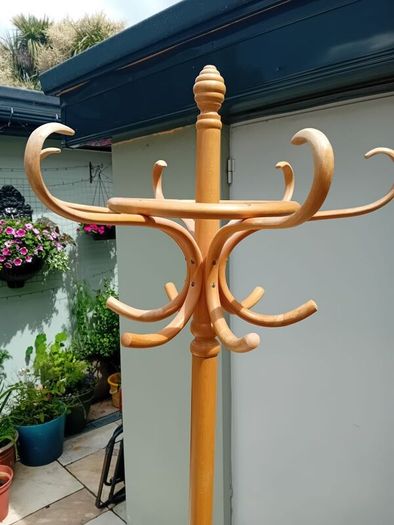Wooden rotating coat stand