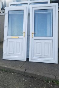 Two Matching PVC Solid PVC Single Doors