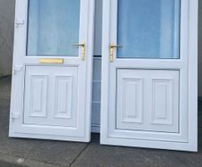 Two Matching PVC Solid PVC Single Doors