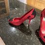 Red high heeled shoes with black lace Image 2