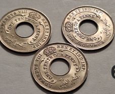 Coins,pound,cent,dollar,penny,rupee,millieme,fils,shilling,centavos,pesos,piastre,paise,pesetas,ore