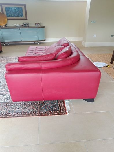 Natuzzi red leather corner sofa or can be separate as shown