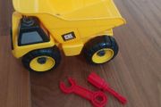 Yellow toy dump truck with take-apart tools