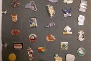 collection of over 100 Vintage Badges pin back from Volvic..Hollywood chewing gum..Fujicolor etc.