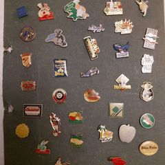 collection of over 100 Vintage Badges pin back from Volvic..Hollywood chewing gum..Fujicolor etc.