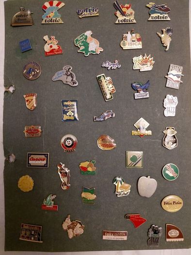 collection of over 100 Vintage Badges pin back from Volvic..Hollywood chewing gum..Fujicolor etc.