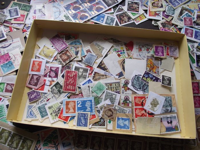 A box with collection of stamps from Great Britain
