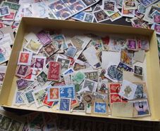 A box with collection of stamps from Great Britain