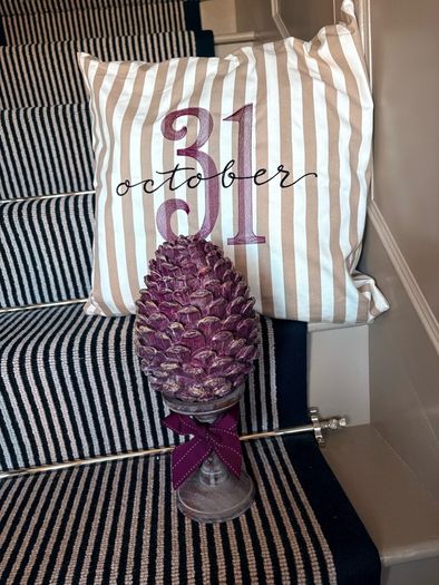 New bespoke oversized autumn Pinecone on distressed wood base in mulberry