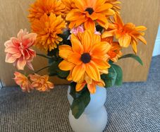 Artificial Orange Flowers in Frosted Glass Vase