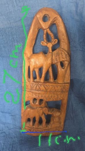 Hand-carved wooden wall hanging