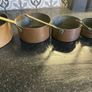 Set of Six Antique Copper brass Graduated Sauce Pans Image 3
