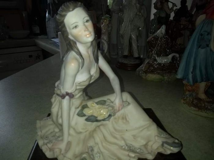 Italian Capodimonte figurine Dear 1987 by BELCAIR of seated lady.