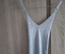 Silver knitted top size fits Xs s
