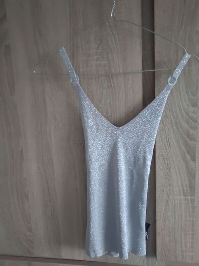 Silver knitted top size fits Xs s