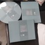 Sets of 4 circular placemats. Grey / duck egg. Image 2