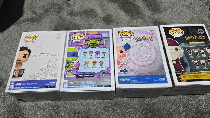 Four Funko Pop Figures