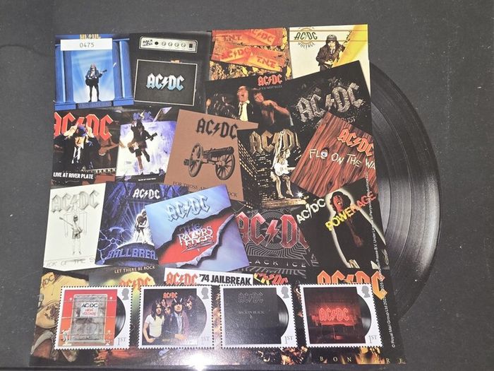 This exclusive Fan Sheet features four First Class stamps from the AC DC Miniature Sheet presented within a bold collage of the bands most legendary albums spanning their incredible five decade career Limited to only 5000 individually numbered sheets worl