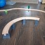 wooden train track set with wooden trains and accessories. Image 6