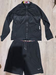 Nike tracksuit size L junior