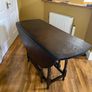 Folding Round Dining Table in Solid Dark Oak Image 2