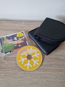 Christmas CD and two cd holders cases.