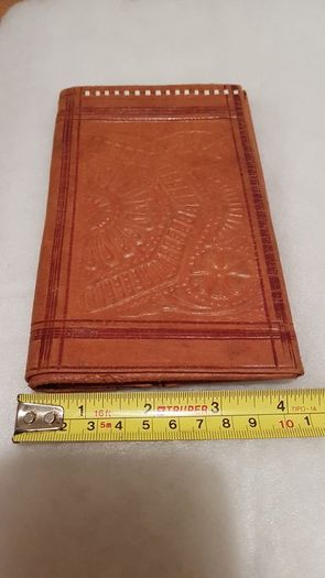 handcrafted made soft leather wallet,with designs ,, thank you,,was used,some wear and tear,,take as is ..