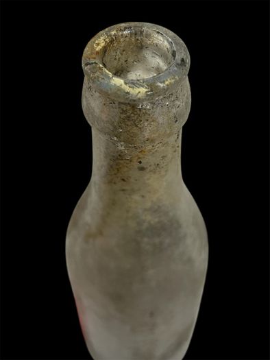 old glass mineral bottle