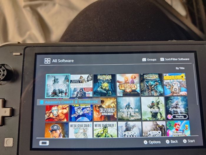 Nintendo switch lite + remote controller+ 20 games