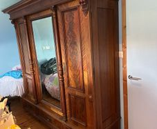 Antique hardwood mirrored wardrobe