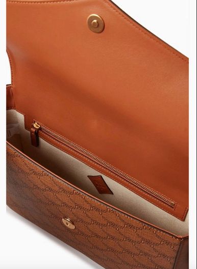 MCM Monogram messenger bag with natural nappa leather trim