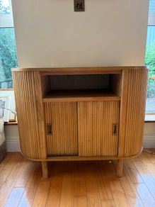 Fluted solid wood sideboard with sliding doors
