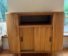 Fluted solid wood sideboard with sliding doors