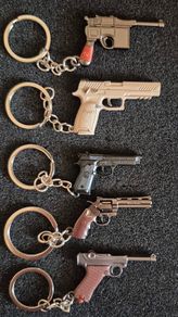 Keyring, firearms, baretta, luger, mauser,sig sauer, colt.