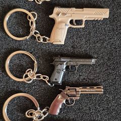 Keyring, firearms, baretta, luger, mauser,sig sauer, colt.