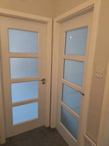 white internal solid wood laminate covered doors x 3