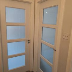 white internal solid wood laminate covered doors x 3