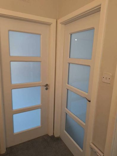 white internal solid wood laminate covered doors x 3