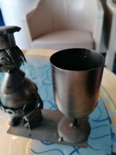Metal chef ornament with wine glass holder