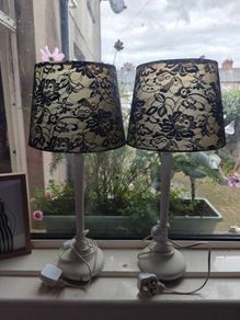 Two black and white lamps