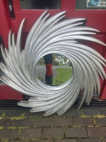 Sunburst swirl silver mirror