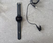 Garmin Forerunner 735XT GPS Multisport Watch and USB cable charger