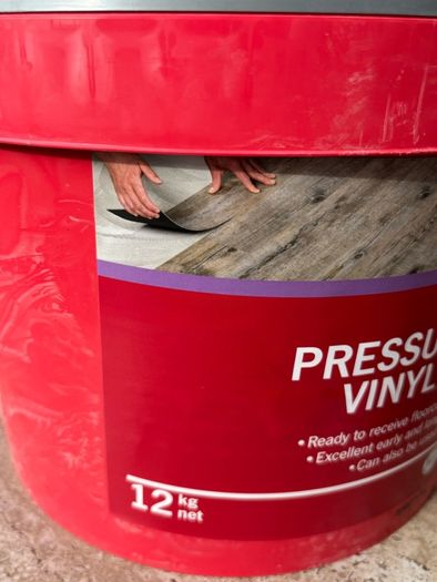 Ardex pressure sensitive vinyl adhesive