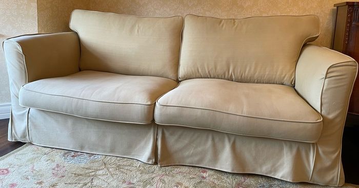 Two Sofas And One Armchair.
