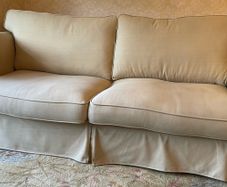 Two Sofas And One Armchair.