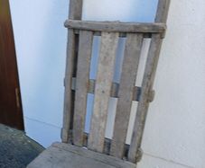 Antique peat wheelbarrow and peat spade