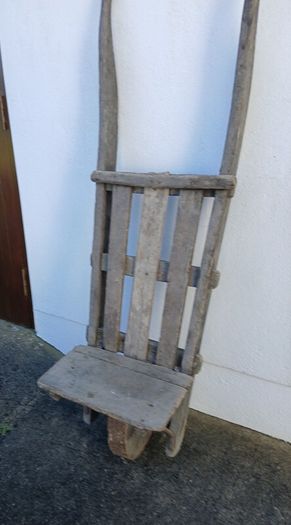 Antique peat wheelbarrow and peat spade