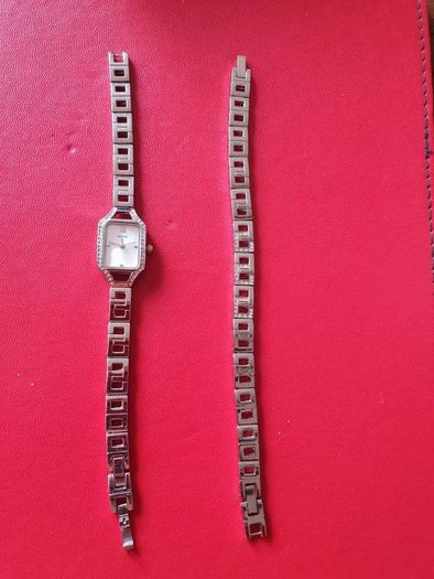 silver watch and matching bracelet